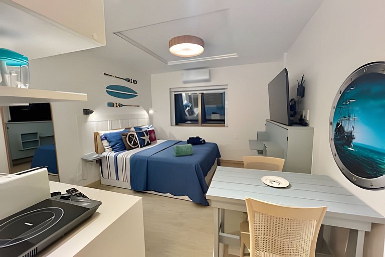 Studio: 5-Star Comfort and Pool Awaiting You.